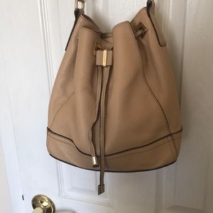 Calvin Klein tan colored purse